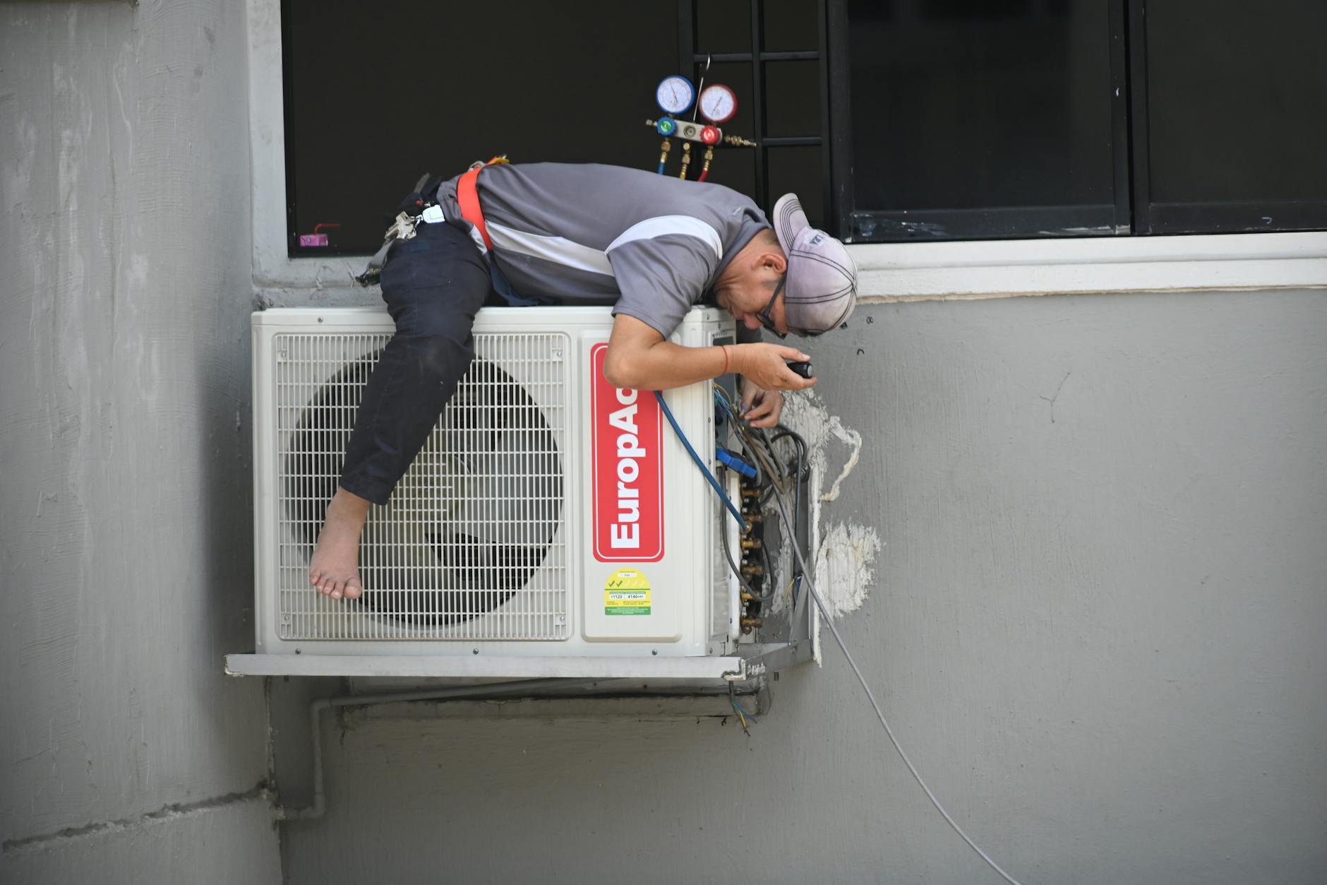 HVAC technician working on residential equipment